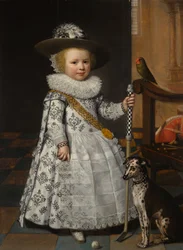 Retrato de un niño con un palo de golf y una pelota